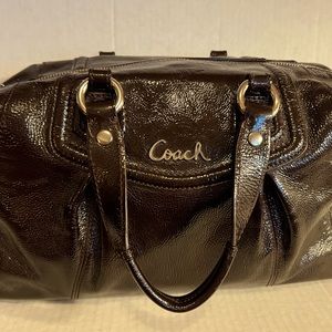Coach chocolate brown patent leather satchel.